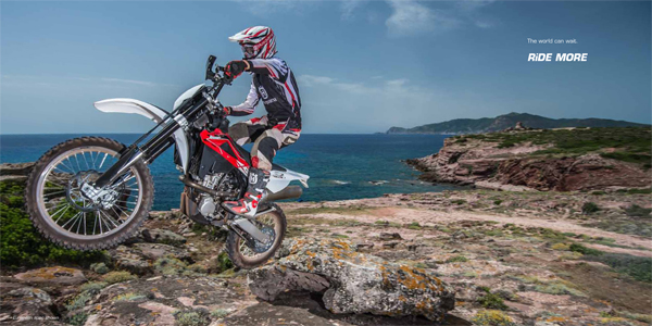 TC250 Husqvarna off-road motorcycle in action in their 2103 brochure.