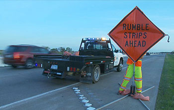 The End-of-Queue Warning System incorporates temporary rumble strips to reduce work zone collisions. TxDOT photo.